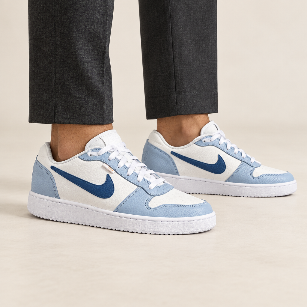 Visuel généré des Nike Ebernon Low portées par un homme avec pantalon habillé