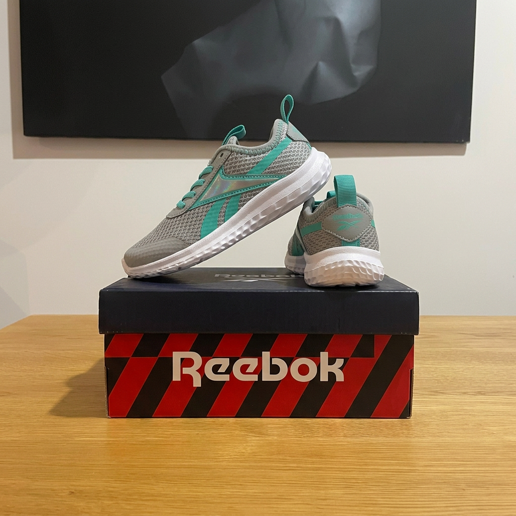 Reebok Rush Runner gris vert, vue arrière boîte retouchée