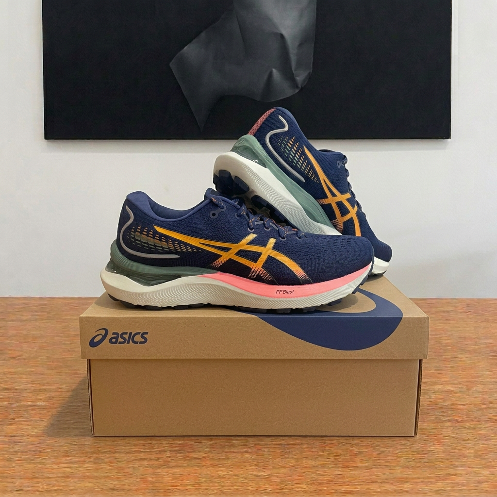 ASICS GEL-CUMULUS 24 TR sur boîte kraft centrée, photo retouchée